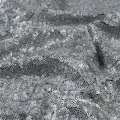 Паєтки сірі матові, настрочені хвилями на сітці ш.125