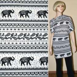 Трикотаж белый с черными слонами и огурцами ш.166