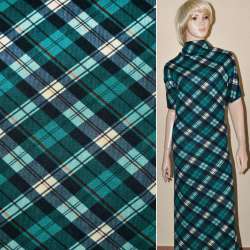 Трикотаж в бирюзово-кремовые и темно-синие ромбы ш.170