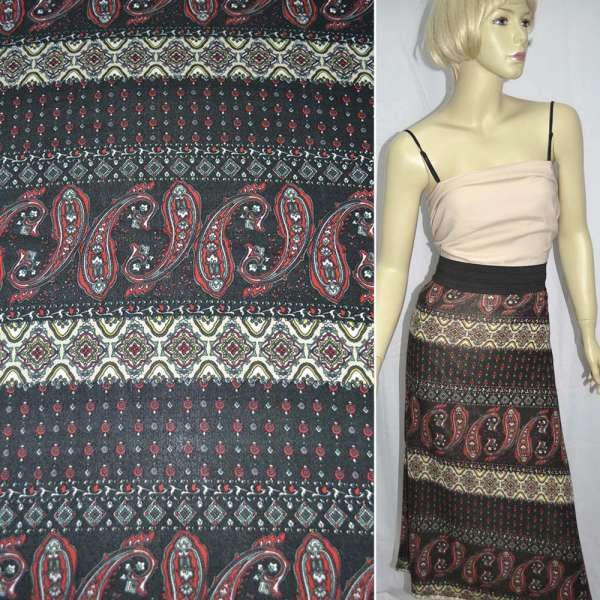 Трикотаж в чорно-бежеві смуги огірками ш.150