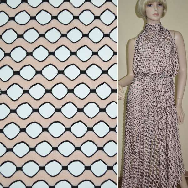 Трикотаж персиковий хвилі з овальними дірочками ш.160