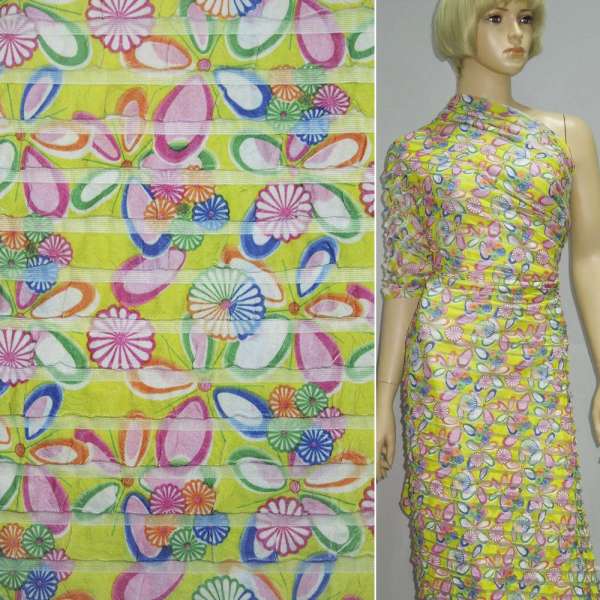 Трикотаж белый с салатовыми рюшами (цветы) ш.150