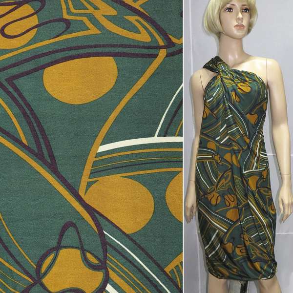 Трикотаж вискозный зеленый с желто-фиолетовыми полосками и кругами ш.140