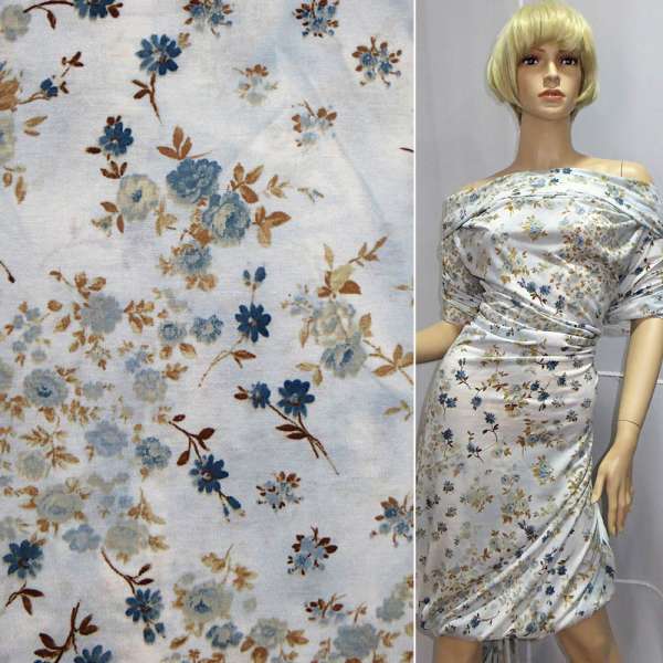 Трикотаж вискозный стрейч бледно-голубой с бледно-голубой веточкой и синие цветы ш.140