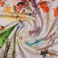 Трикотаж вискозный стрейч молочный в сине-желто-розовые цветы ш.149