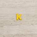 Пришивной декор буква K желтая, 25мм