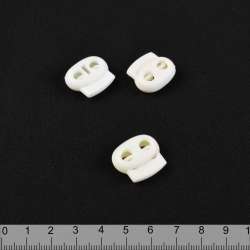 Фиксатор пластик 2 отверстия 4 мм овальный 22мм молочный