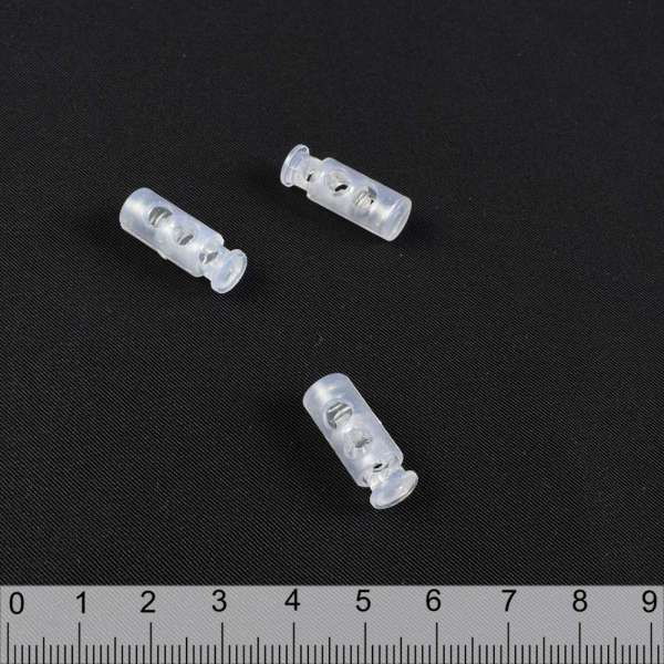 Фиксатор пластик 2 отверстия 4мм бочонок 22мм прозрачный