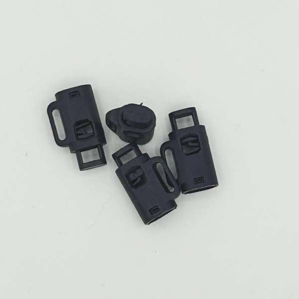 Фиксатор пластик 1 отверстие 4мм бочонок 18мм черный