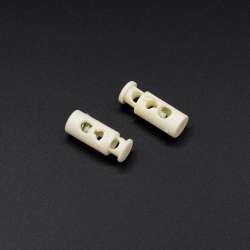 Фиксатор пластик 2 отверстия 4мм бочонок 17мм молочный
