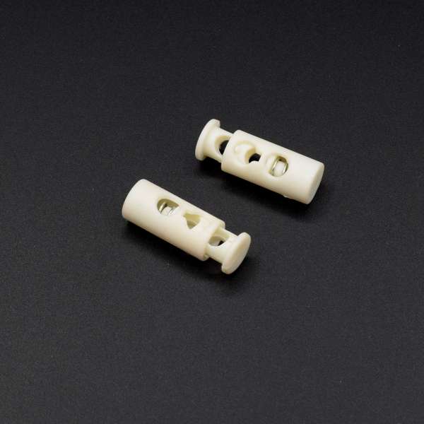 Фиксатор пластик 2 отверстия бочонок 20мм молочный