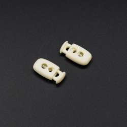 Фиксатор пластик 2 отверстия бочонок 15мм молочный