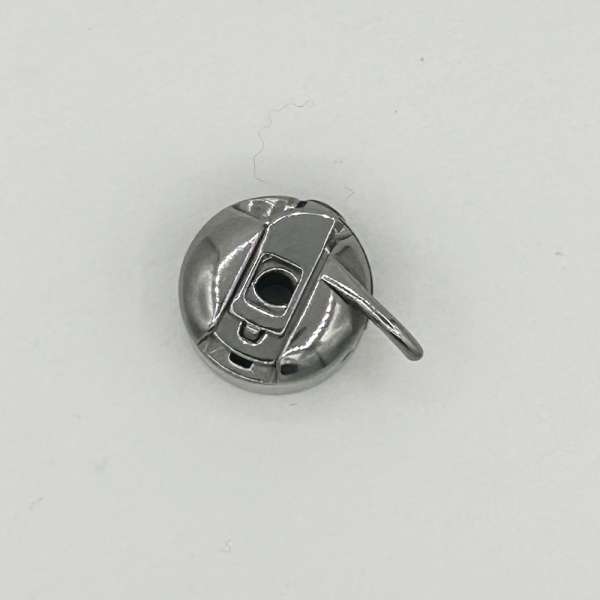 Шпульный колпачок