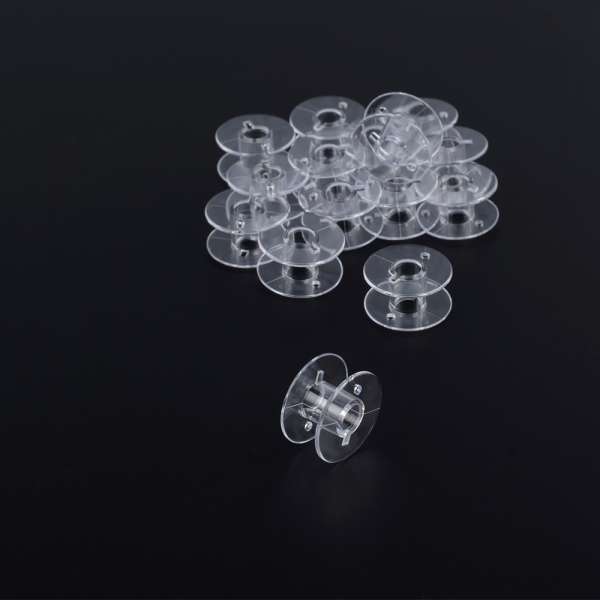 Шпулька пластиковая для бытовых машин прозрачная